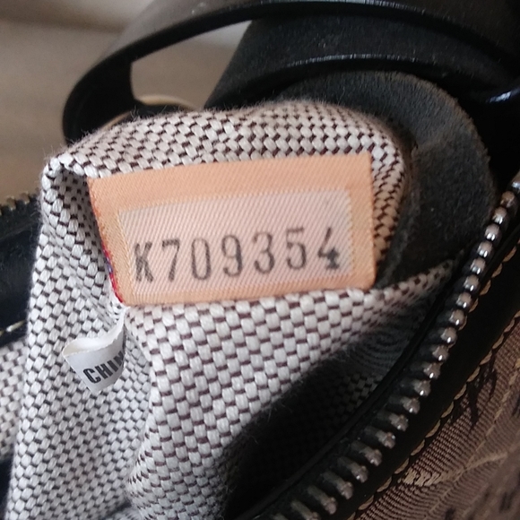 Dooney & Bourke DB Triangle Quilt Pattern Canvas & Leather Small Baguette. - Picture 11 of 11